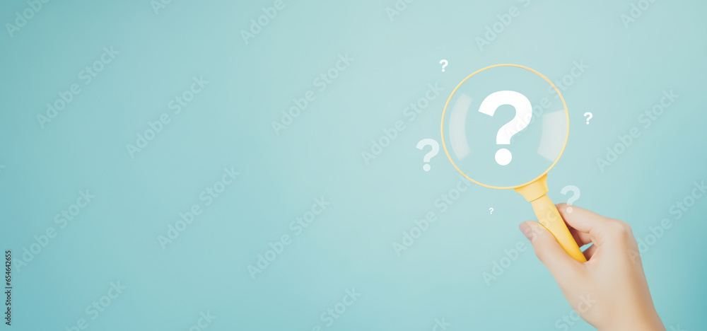 International ask a question day concept, Magnifying glass focused on question mark, Answer, Q&A, Communication and Brainstorming International ask a question day concept, Magnifying glass focused on question mark, Answer, Q&A, Communication and Brainstorming
