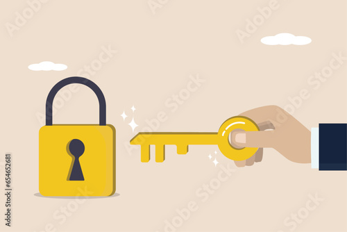 The key to success, the concept of opening up business success, career path opportunities, a businessman's hand holding a golden key and opening the lock hole to achieve business targets.