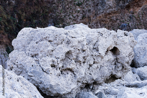 Pile of Rocks on a limestone mining area. Rock Stacking on limestone mining area.  Limestone mining on Mount Beko photo
