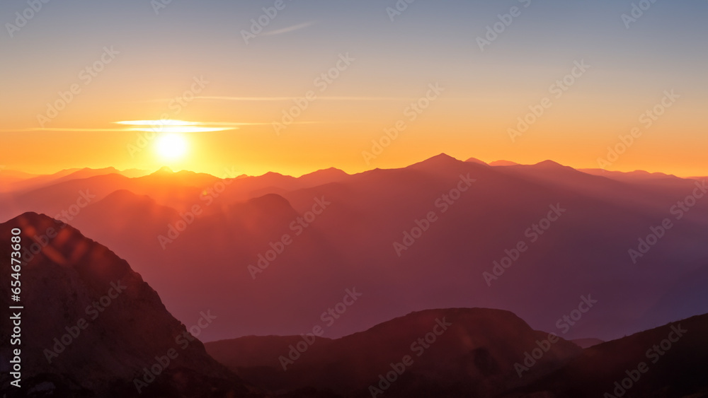 Beautiful sunrise over the mountain landscape.