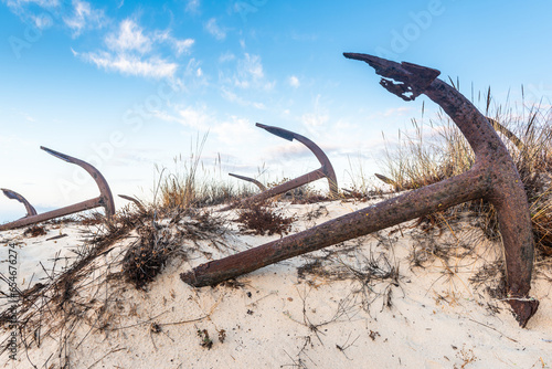Anchor Cemetery of Santa Luzia, Portugal. Sand dunes of Praia do Barril beach, Algarve