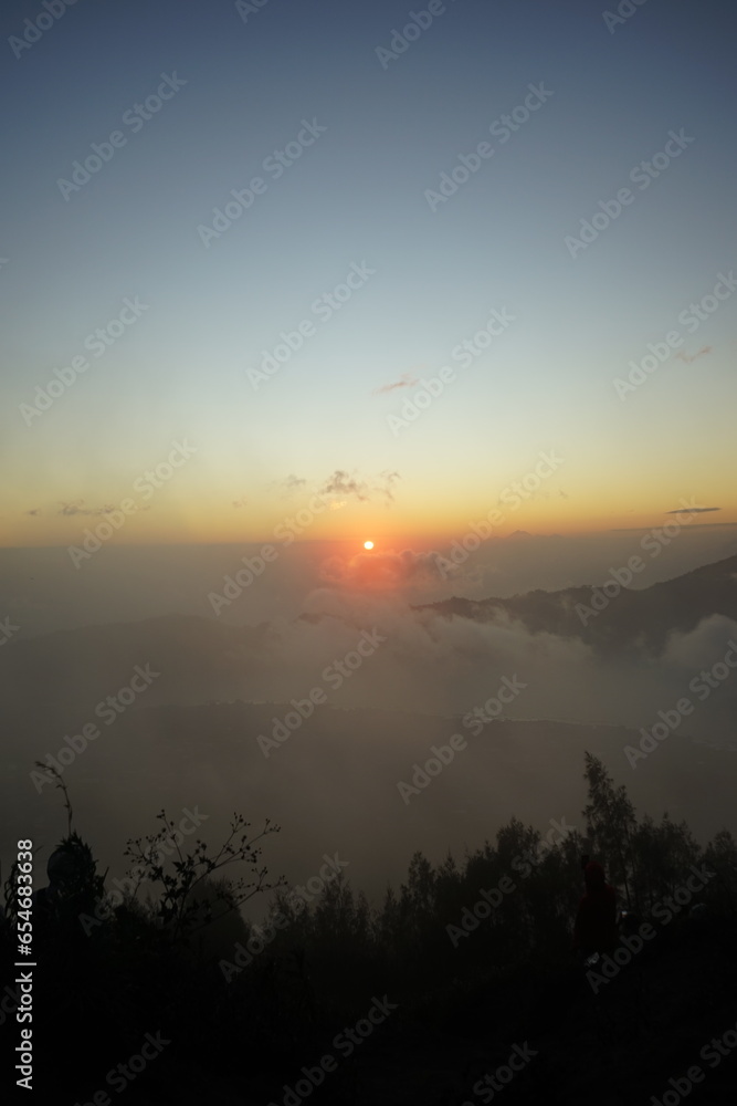 Fototapeta premium sunrise on mount batur indonesia volcano, vulcanic sunrise
