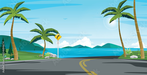 The road leading to the seaside has traffic signs.