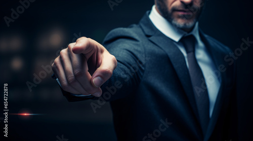 businessman touching virtual screen - handsome man pointing at you ,businessman pointing finger photo
