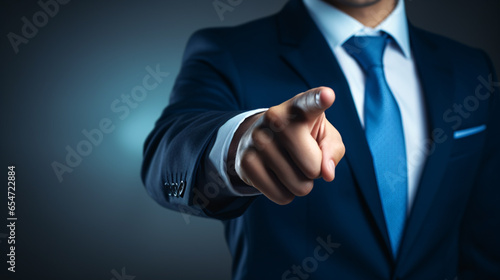 professional business man hand touching screen - man pointing at you photo