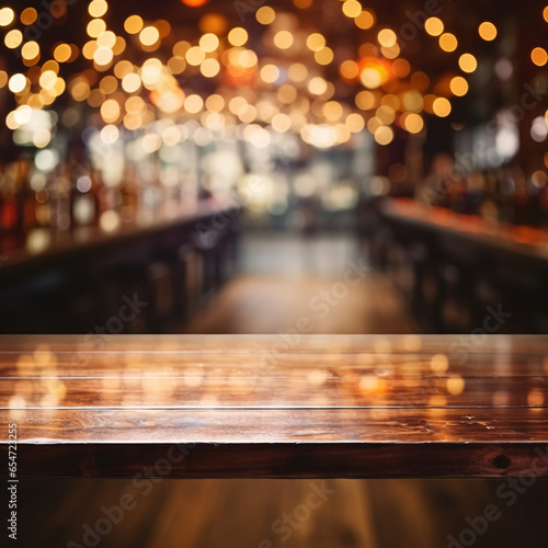 Empty reflective wooden table in a pub or bar with night lights and bokeh - presentation mockup