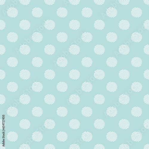 White polka dots on pastel blue background
