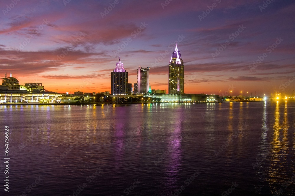 Downtown Mobile waterfront skyline at sunset