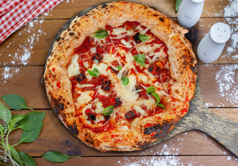 Pizza Parmigiana straight from a woodfired oven. Closeup, baked in a