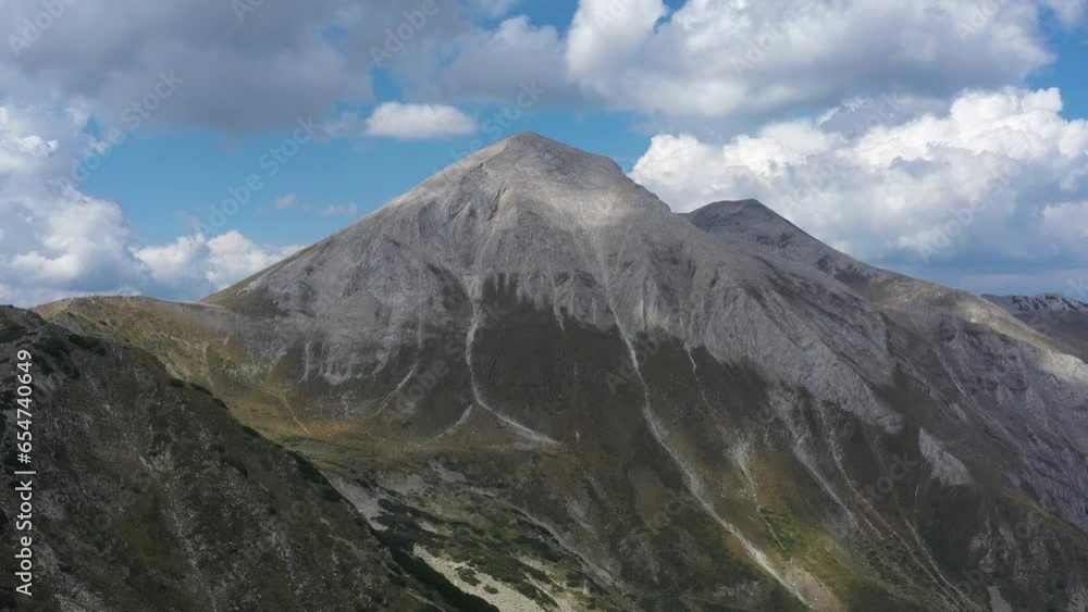 Flight over Pirin Mountain in front of Vihren Peak in Bulgaria, Europe. HQ 4K Apple ProRes video. Flight over Pirin Mountain in front of Vihren Peak in Bulgaria, Europe. HQ 4K Apple ProRes video.