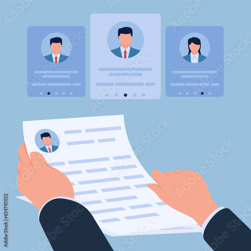 hand holding resume of prospective new employee, metaphor of recruitment