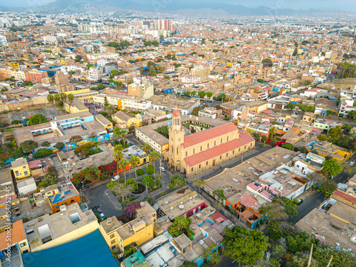 Fototapeta Naklejka Na Ścianę i Meble -  Aerial view of the Barranco neighborhood in Lima, Peru in 2023. Spanish colonial style historic buildings. Neighborhood with new houses and also many houses degraded by time. Gastronomic region 