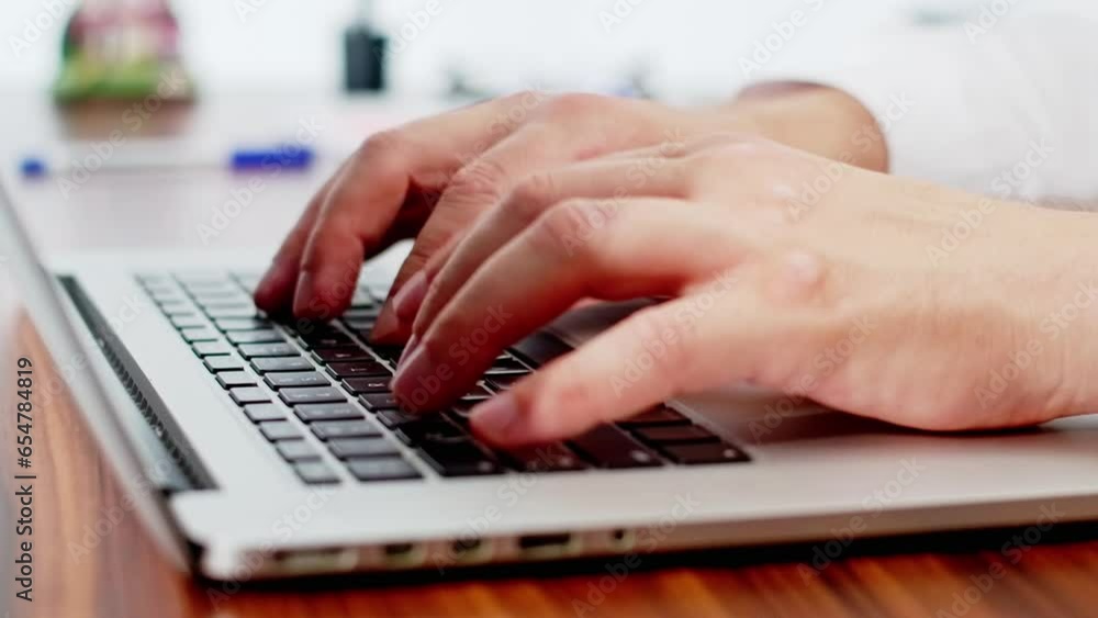 Camera slides around the office worker's hands typing on a laptop keyboard in the office. Businessman working on a laptop. Man searches for new job on the Internet. Business concept. Camera slides around the office worker's hands typing on a laptop keyboard in the office. Businessman working on a laptop. Man searches for new job on the Internet. Business concept.