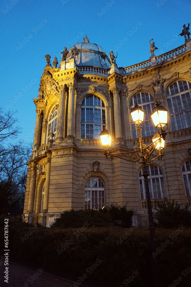 Castle in Budapest (Hungary) at evening with golden lights (Az Apostolok tornya)