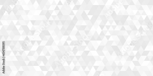 Abstract light background of small triangles in white and gray colors. Abstract white geometric vector background