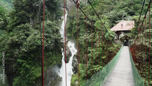 spectacular waterfall of El Pailon del Diablo close to Banos Santa Agua in the andes mountains of Ecuador, South America. photo
