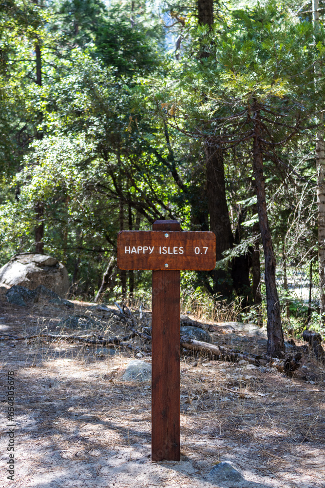 Wooden sign with distance to the Happy Isles, Yosemite National Park, California, USA. Wooden sign with distance to the Happy Isles, Yosemite National Park, California, USA.