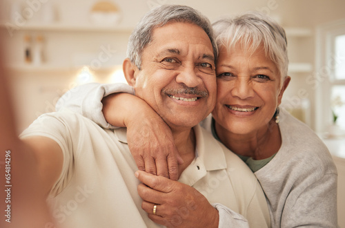 Selfie, smile and old couple in home with love, support and portrait of marriage in retirement together. Digital photography, face of happy man and senior woman in apartment to post on social media.