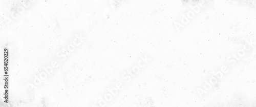 Grungy white concrete or cement wall as background, close up retro plain white color cement wall panoramic background texture.