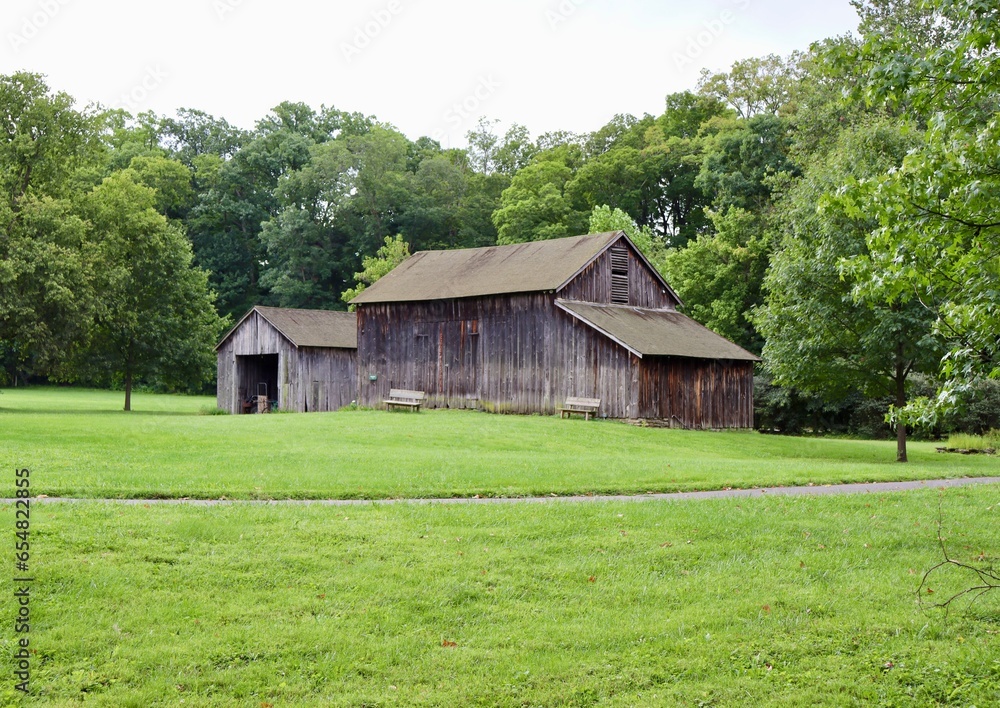 The old wood barn in the countryside. The old wood barn in the countryside.