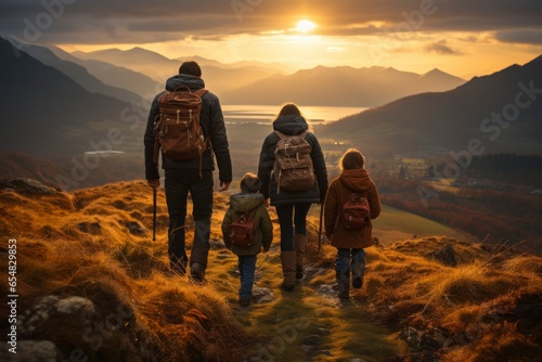 A family hiking together in a scenic mountain landscape, with children exploring the wilderness and parents leading the way