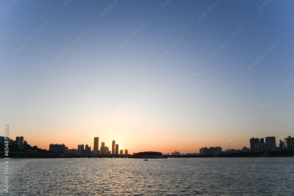 Beautiful sunset over the city at Han River, Seoul.