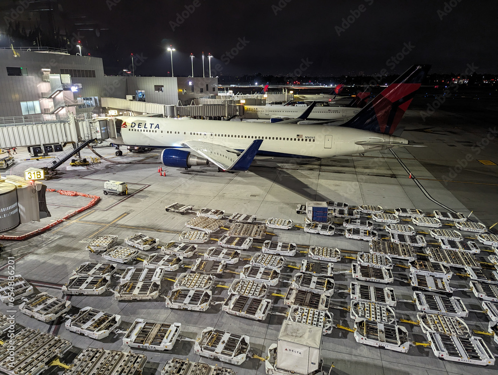 Los Angeles, CA September 19 2023 Carts of luggage in front of Delta