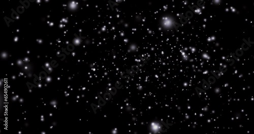 The video background showcases a mesmerizing scene of space filled with sparkling stars and ethereal auroras dancing across the sky. Waves of abstract patterns and particles sweep through the screen, 