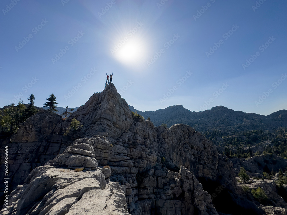 Summit goals and wonderful views of two climbers Summit goals and wonderful views of two climbers