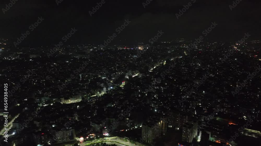 city at night panning aerial. city at night panning aerial.