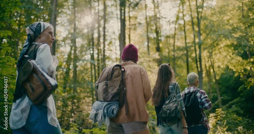 Wallpaper Mural Tourists With Backpacks Exploring Forest During Vacation Torontodigital.ca