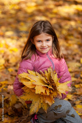 child in autumn park