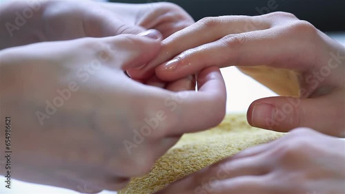 Close up fingers to massage nail salon photo
