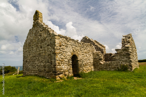 Beautiful old welsh chapel or church, ruin, sky as copyspace top. photo