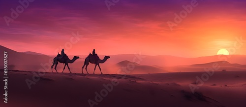 camels in the desert, Sahara, against the backdrop of a beautiful sunset, bright colors, screensaver for your computer desktop