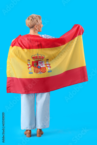 Mature woman with flag of S...