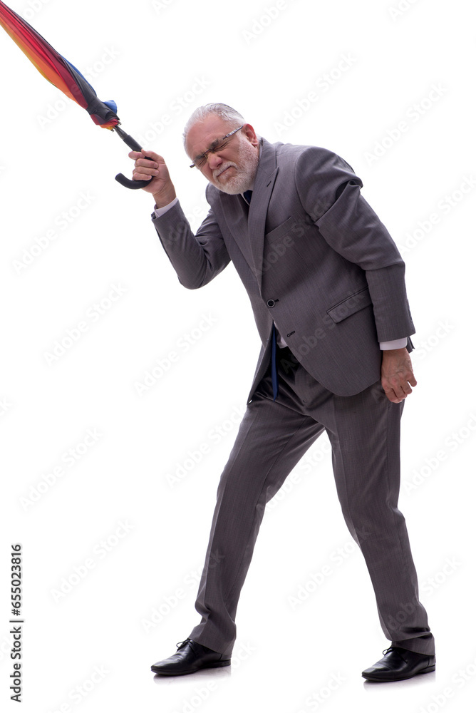 Old businessman holding an umrella isolated on white Old businessman holding an umrella isolated on white