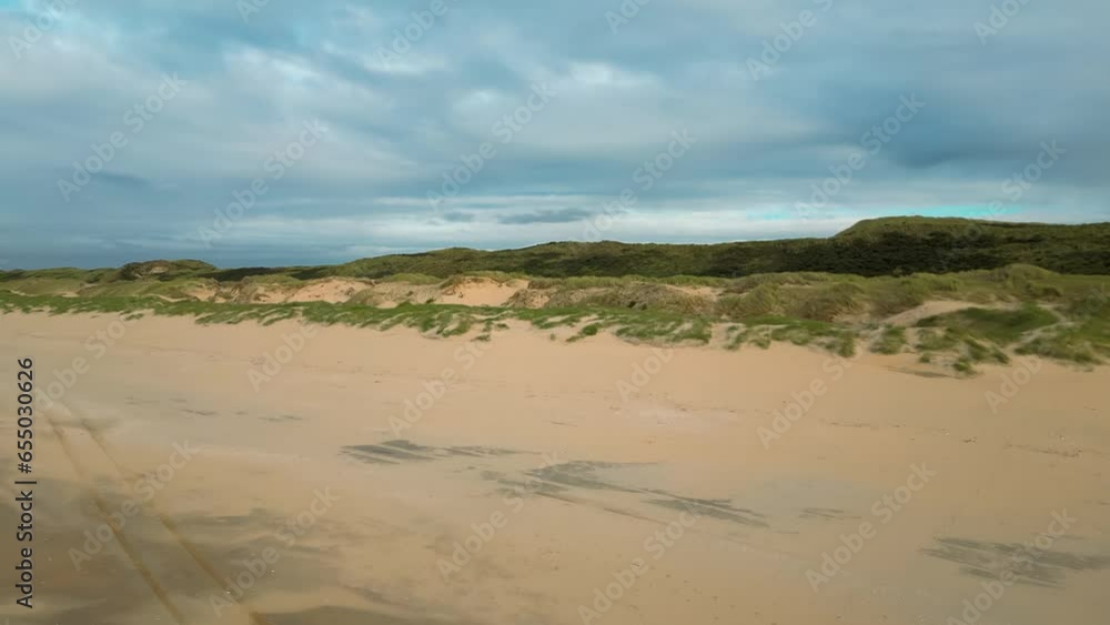 Aerial drone view of northern sea coastline dunes, beach, sea. High quality 4k footage Aerial drone view of northern sea coastline dunes, beach, sea. High quality 4k footage