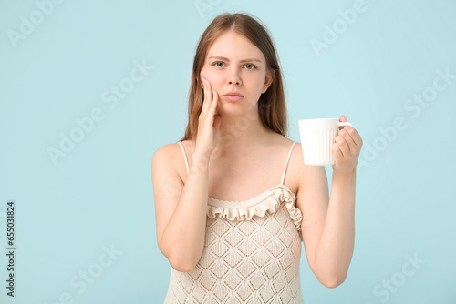 Young woman with sensitive ...