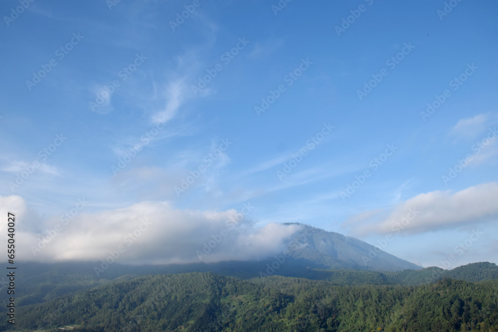 Beautiful natural views on the hill with a beautiful combination of white and blue skies Beautiful natural views on the hill with a beautiful combination of white and blue skies