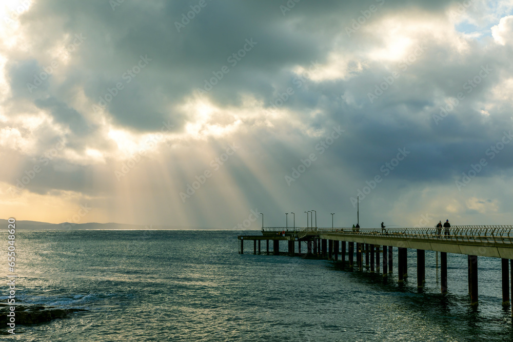 Photograph of the jetty on a foggy cloudy morning in the town of Lorne on the Great Ocean Road in Victoria in Australia