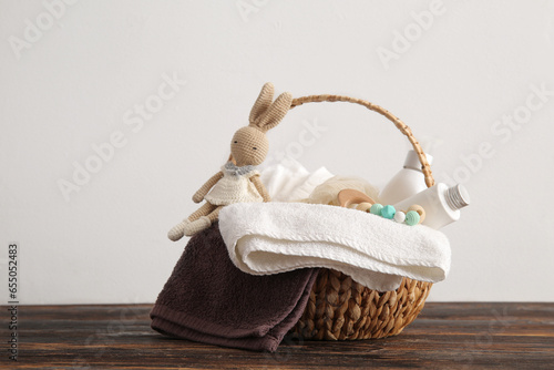 Wicker basket with gifts fo...