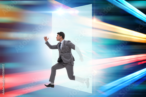 Businessman entering virtual world in business concept