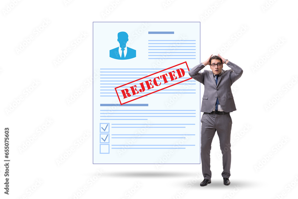 Man receiving rejection notice on his cv Man receiving rejection notice on his cv