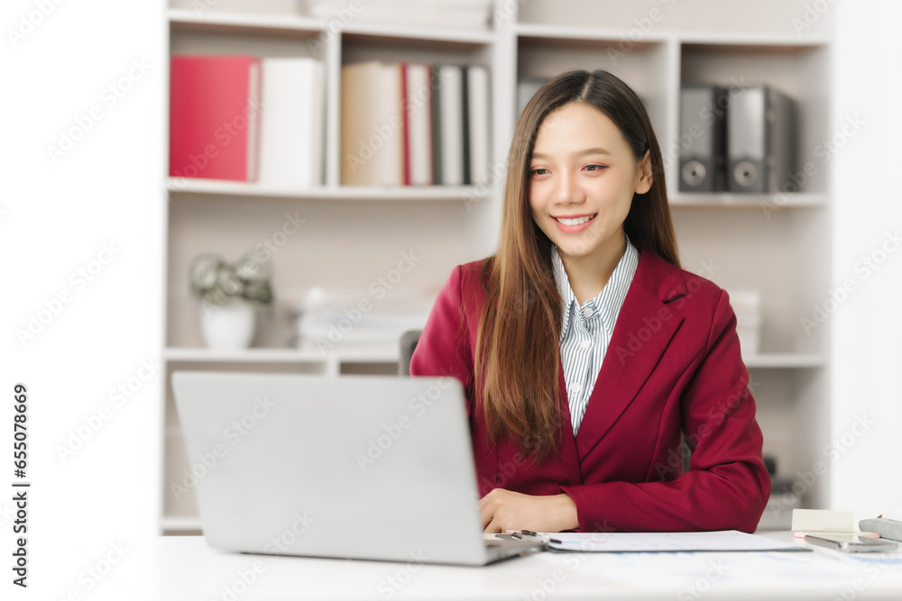Asian people independent investment consultant captured in her element at office, donning vibrant red business suit. Her poised demeanor epitomizes blend of tradition modernity in today finance world Asian people independent investment consultant captured in her element at office, donning vibrant red business suit. Her poised demeanor epitomizes blend of tradition modernity in today finance world