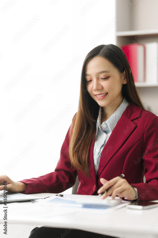 Asian people independent investment consultant captured in her element at office, donning vibrant red business suit. Her poised demeanor epitomizes blend of tradition modernity in today finance world Asian people independent investment consultant captured in her element at office, donning vibrant red business suit. Her poised demeanor epitomizes blend of tradition modernity in today finance world