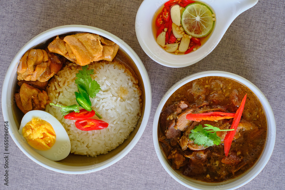 Traditional Thai Chicken and gravy with rice and egg Traditional Thai Chicken and gravy with rice and egg