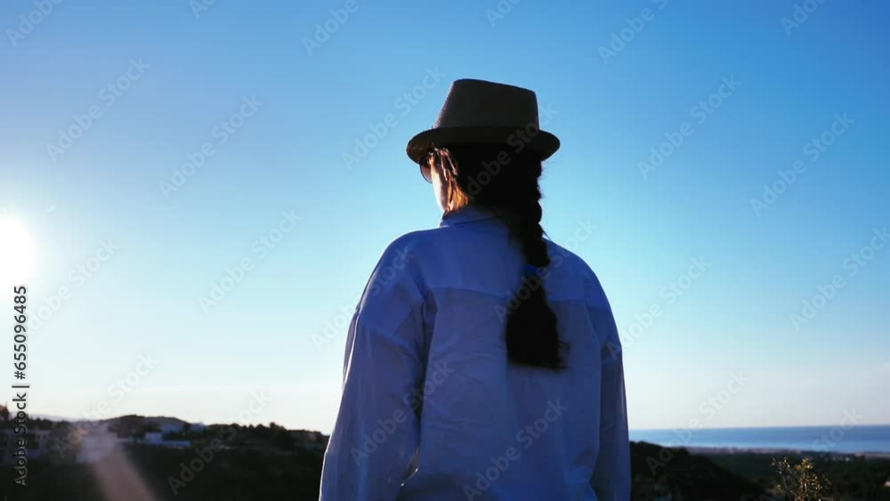 City Awakening: Woman's Sunrise Reverie on the Mountain Peak City Awakening: Woman's Sunrise Reverie on the Mountain Peak