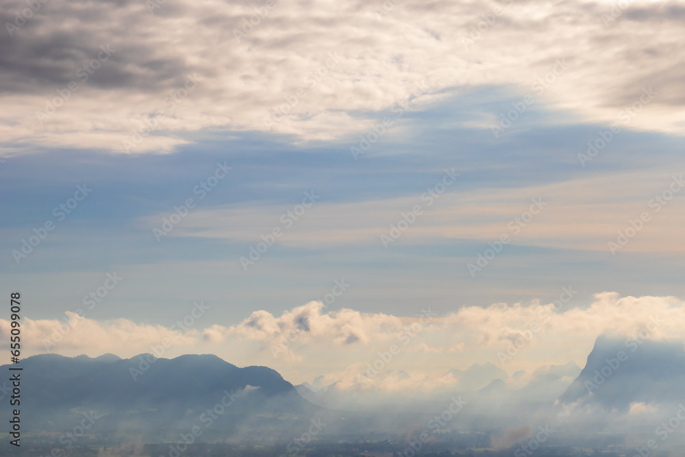 View of mountain landscape and misty clouds in the morning.