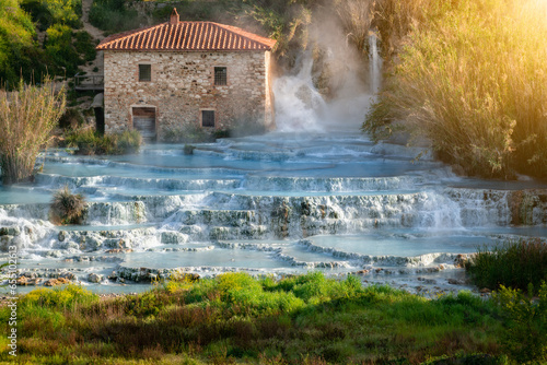 Empty natural spa with turquoise water at Saturnia thermal baths, in Tuscany, Italy. Le Cascate del Mulino is a perfect place to relax in waterfalls and hot springs. photo